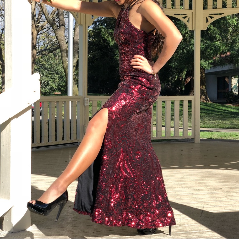 red sequins prom dress with slit and crossed back